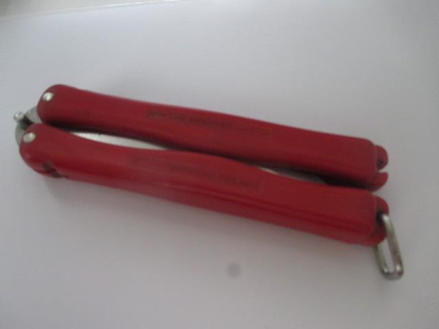 Vintage Hackman Finland Knife.  Red Plastic Handles.