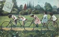 Surrealism multi babies bicycle fantasy vintage postcard picture